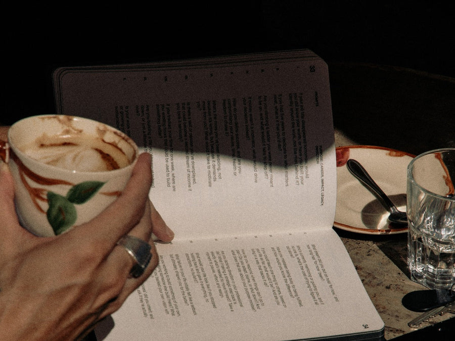 journal and coffee