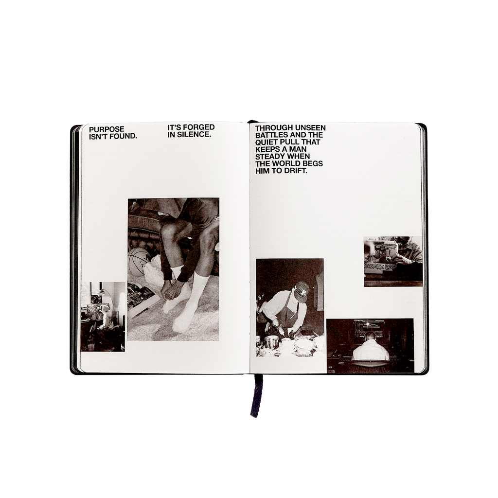 Open journal with black and white photos and text on a white background